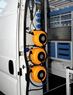 06_A set of cable and hose winders in a van